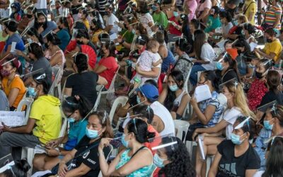 Residents of Barangay Pasong Tamo in Quezon City are herded at a covered court during the Department of Social Welfare and Development 4Ps’ — Pantawid Pamilyang Pilipino Program — verification of application for conditional cash grants to indigents on June 18, 2021. This is part of the government’s program to help the poorer population improve the health, nutrition and education of their children aged 0 to 18. The crowd, however, seemed to have forgotten about the pandemic as they failed to observe the health protocol on physical distancing to avoid Covid-19 infection. PHOTO BY RUY L. MARTINEZ