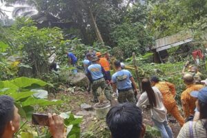 This handout photo taken on February 7, 2024 and obtained from the Facebook page of the Office of the Provincial Fire Marshal (OPFM) Davao de Oro shows responders conduct rescue operations at the site of a landslide in Maco, Davao de Oro. AFP PHOTO / Office of the Provincial Fire Marshal (OPFM) Davao de Oro