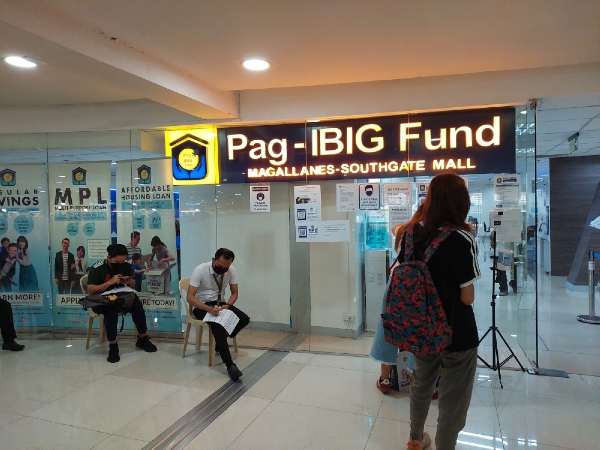 NEW HIGH Photo taken on Feb. 2, 2022 show beneficiaries line up at a Pag-IBIG Fund satellite office in Makati City. Pag-IBIG Fund announced on Wednesday, Oct. 11, 2023, that home loan releases in the last three quarters hit P88.30 billion. PHOTO BY AARON RONQUILLO