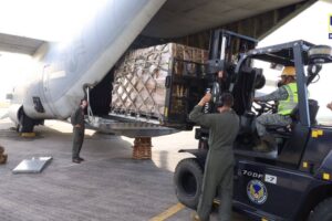 FOOD PACKS FOR FLOOD VICTIMS The Department of Social Welfare and Development oversees the loading of some 2,400 family food packs (FFPs) in two US C-130 planes at the Villamor Airbase in Pasay City on Monday, Feb. 12, 2024 for residents in the Davao Region affected by floods. PHOTO COURTESY OF DSWD CENTRAL OFFICE