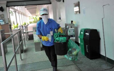 Camille Villar Advocates for Waste Workers’ Health and Welfare Program A worker wearing mask collects waste from a dust bin. AFP File Photo