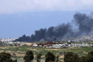 A picture taken from a position in southern Israel on February 16, 2024 shows smoke billowing following Israeli bombardment on the Gaza Strip, amid ongoing battles between Israel and the Palestinian militant group Hamas. (Photo by JACK GUEZ / AFP)