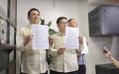 Filed House leaders show copies of Resolution of Both Houses 7. Photo by Reina Tolentino
