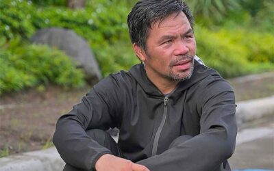 Pacquiao’s Olympic Dream Comes to an End Manny Pacquiao sitting after workout