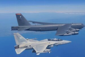 A Philippine Air Force FA-50 (bottom) and US B-52Hs bomber aircraft (top) fly over the Philippine exclusive economic zone during the joint maritime cooperative activity on Monday (Feb. 19, 2024). The air patrol covering areas 90 nautical miles west of Candon, Ilocos Sur, and 50 nautical miles northwest of Lubang, Mindoro was conducted under the third MCA that started on Feb. 9. Photo courtesy of the PAF
