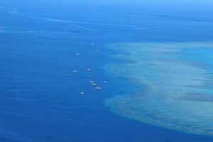 This file photo shows Filipino fishermen were spotted over Bajo de Masinloc during the aerial surveillance of the Philippine Coast Guard (PCG). Photo from Philippine Coast Guard