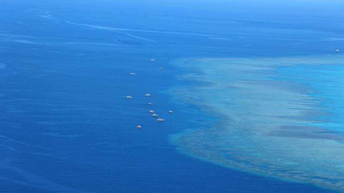 This file photo shows Filipino fishermen were spotted over Bajo de Masinloc during the aerial surveillance of the Philippine Coast Guard (PCG). Photo from Philippine Coast Guard