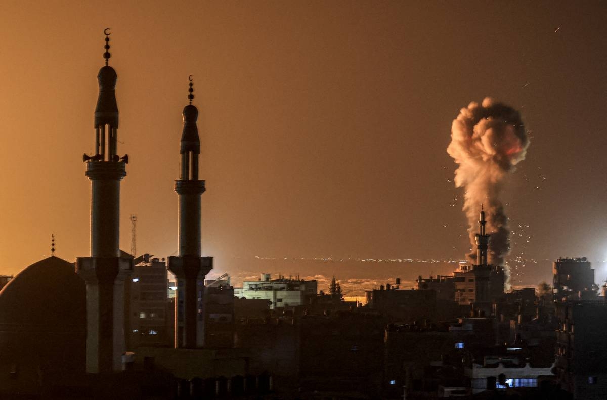 Smoke billows during Israeli bombardment in Rafah on the southern Gaza Strip on February 6, 2024 amid ongoing battles between Israel and the Palestinian militant group Hamas. (Photo by Mahmud Hams / AFP)