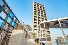 a building called house hotel  al khiran
