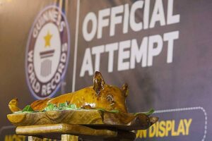 WORLD RECORD The Philippines set a Guinness World Record for the most number of pork dishes displayed and served during the opening ceremonies of the 2024 Hog Festival at the Araneta Center in Quezon City on Friday, March 1, 2024. The National Federation of Hog Farmers Inc. spearheaded the attempt with the support of (not in photo) Sen. Cynthia Villar, Quezon City Mayor Josefina ‘Joy’ Belmonte, and Agriculture Secretary Francisco Tiu Laurel Jr. Guinness set the record to beat at 300. PHOTO BY JOHN ORVEN VERDOTE