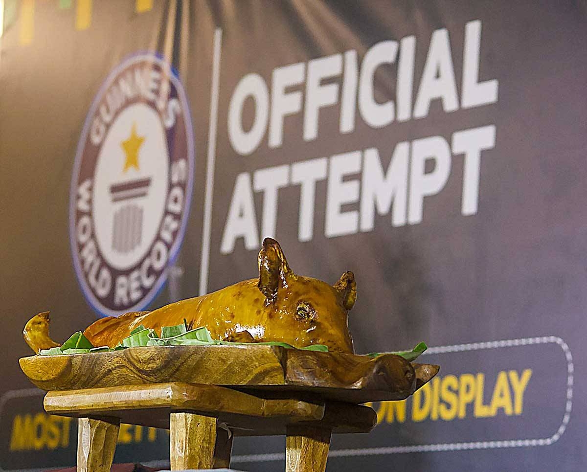 WORLD RECORD The Philippines set a Guinness World Record for the most number of pork dishes displayed and served during the opening ceremonies of the 2024 Hog Festival at the Araneta Center in Quezon City on Friday, March 1, 2024. The National Federation of Hog Farmers Inc. spearheaded the attempt with the support of (not in photo) Sen. Cynthia Villar, Quezon City Mayor Josefina ‘Joy’ Belmonte, and Agriculture Secretary Francisco Tiu Laurel Jr. Guinness set the record to beat at 300. PHOTO BY JOHN ORVEN VERDOTE