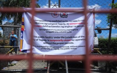 Clash Over Jurisdiction: Taguig Closes Park, Makati Warns of Possible Violence Taguig personnel padlock the Makati Park and Garden in West Rembo, Taguig City, Sunday. Makati City personnel are still seen inside the park while Taguig police and other Taguig LGU personnel are situated outside the park. PHOTOS BY J. GERARD SEGUIA