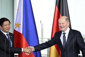 German Chancellor Olaf Scholz (R) and the President of the Philippines Ferdinand "Bongbong" Marcos shake hands after addressing a joint press conference at the Chancellery in Berlin, on March 12, 2024. (Photo by Tobias SCHWARZ / AFP)