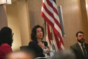 US Secretary of Commerce Gina Raimondo (C) speaks during a meeting with business executives at a hotel in Manila on March 12, 2024. (Photo by TED ALJIBE / AFP)