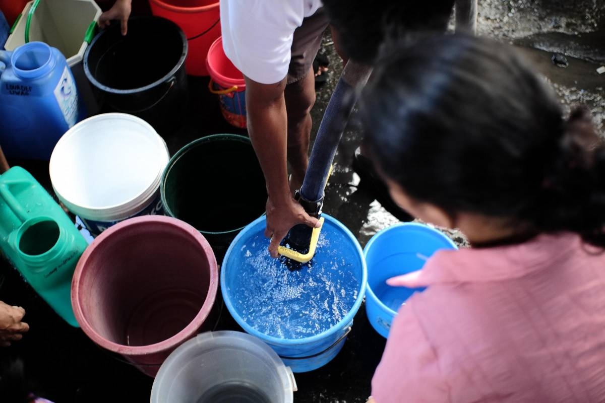 A photo dated March 7, 2023 shows Barangay 185 residents in Pasay City line up as water tankers provide free water. According to the Philippine Statistics Authority, there has been an improvement in providing water to Filipinos nationwide. PHOTO BY J. GERARD SEGUIA