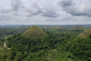 Sadly, it has become nearly impossible to take a photo of Bohol’s famed Chocolate Hills without evidence of some human encroachment being in the picture. Preserving unique natural features so they continue to be worth visiting should be a key priority for tourism policy. PHOTO BY BEN KRITZ