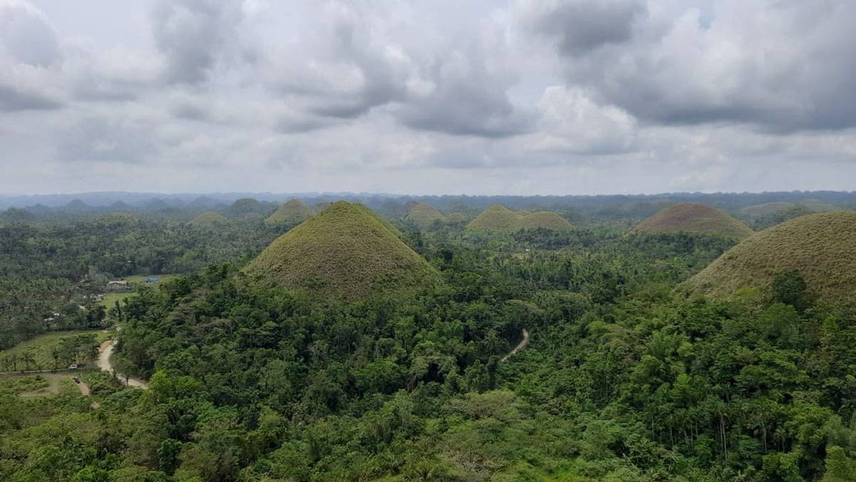 Sadly, it has become nearly impossible to take a photo of Bohol’s famed Chocolate Hills without evidence of some human encroachment being in the picture. Preserving unique natural features so they continue to be worth visiting should be a key priority for tourism policy. PHOTO BY BEN KRITZ