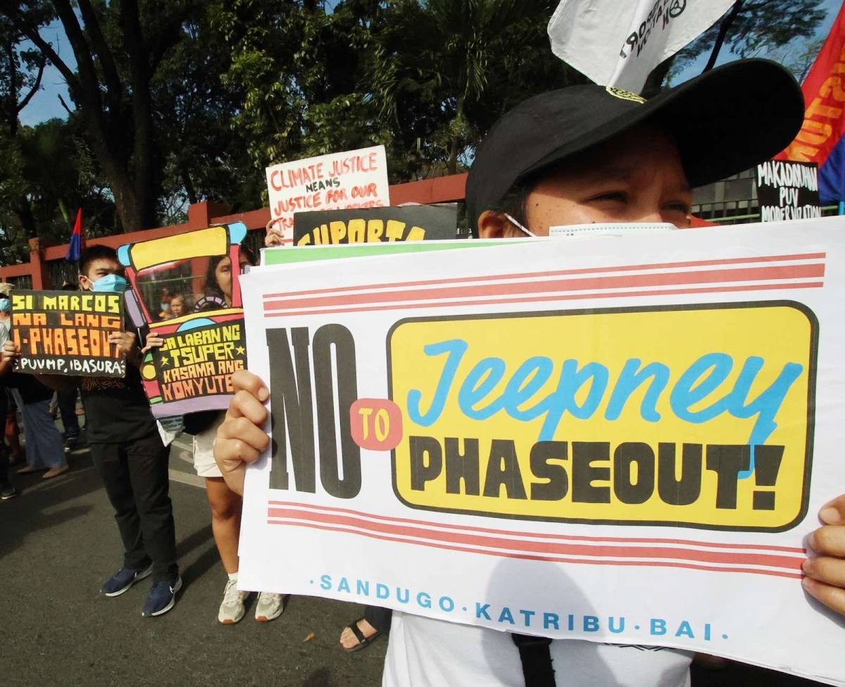 Members of Pasada Network, led by PISTON and MANIBELA, hold a protest rally against the government's PUV modernization plan outside the House of Representatives in Quezon City on Wednesday, Jan. 31, 2024. PHOTOS BY ISMAEL DE JUAN