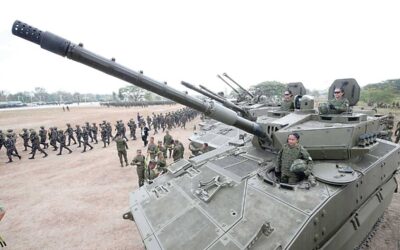 WOMEN ON TOP Three women of the Philippine Army (PA) pose atop one of its tanks as they and the rest of the troops put on a show of the PA’s defense capabilities on its 127th anniversary in Capas, Tarlac, on Friday, March 22, 2024. Defense Secretary Gilbert Teodoro Jr. (not in photo) delivered the speech on behalf of President Ferdinand Marcos Jr., who was unable to attend for health reasons. PHOTO BY RENE H. DILAN