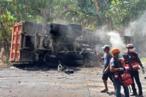 This handout photo taken and received on March 25, 2024 courtesy of Mark Dale Requita Montenegro shows an overturned truck following an accident in Antipas, North Cotabato. AFP PHOTO / Mark Dale Requita Montenegro