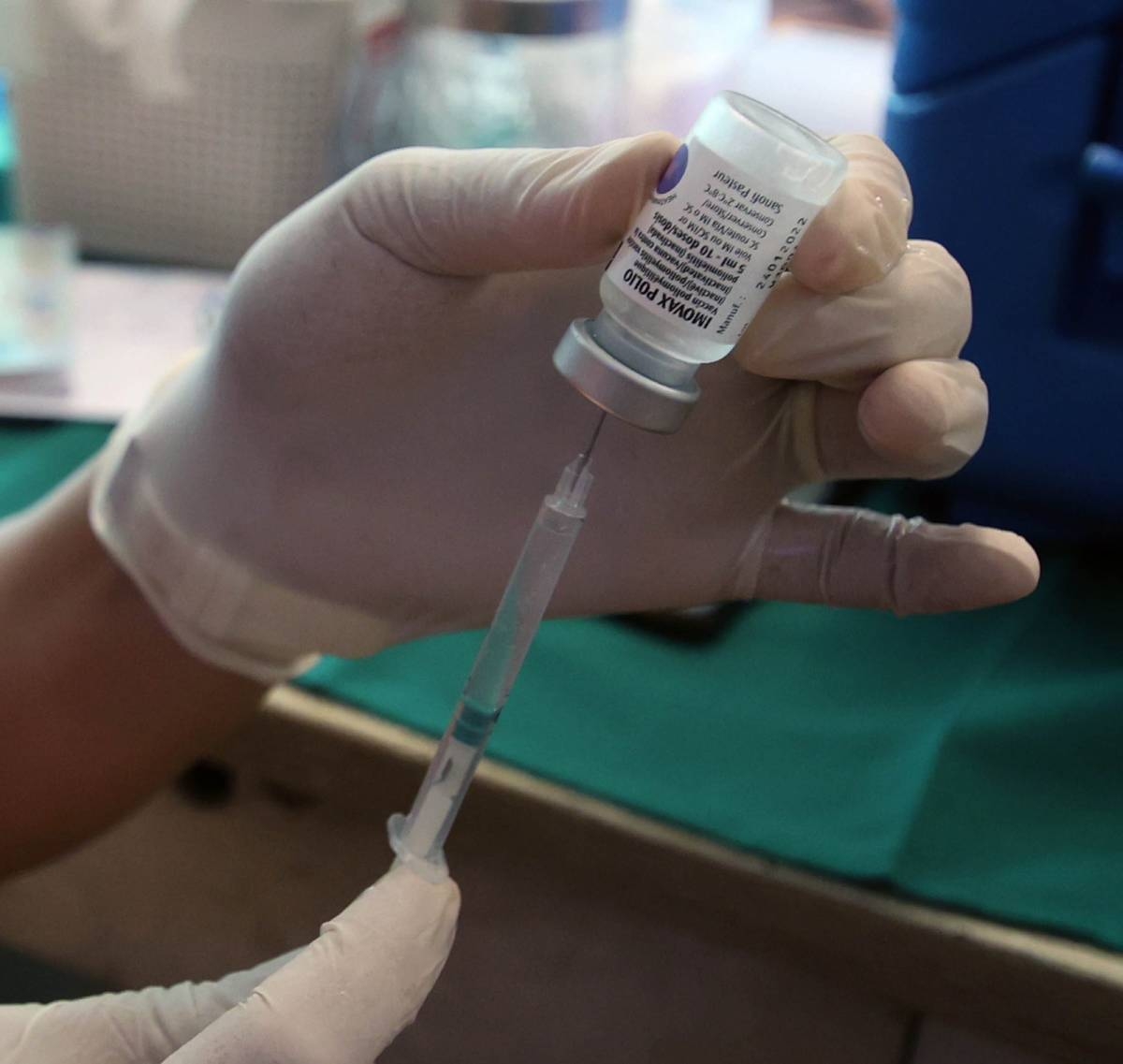 A health worker shows Pentavalent vaccine against pertussis or whooping cough at a health center in Quezon City on Friday, March 22, 2024. The Quezon City government declared an outbreak of pertussis after logging 23 cases including four deaths, mostly infants from 22 to 60 days old, from Jan. to March 20. PHOTO BY ISMAEL DE JUAN