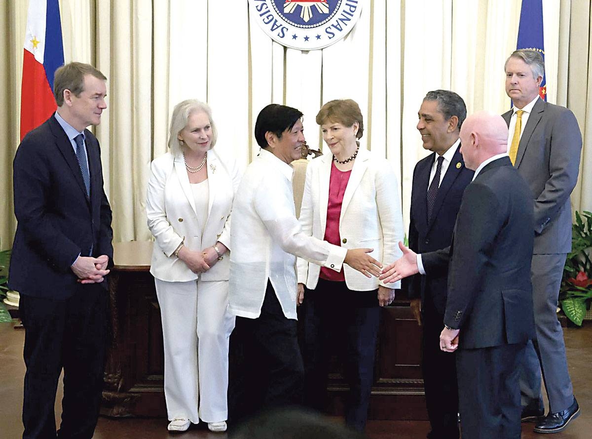 PALACE VISIT President Ferdinand Marcos Jr. welcomes members of the US congressional delegation. PPA POOL / MARIANNE BERMUDEZ