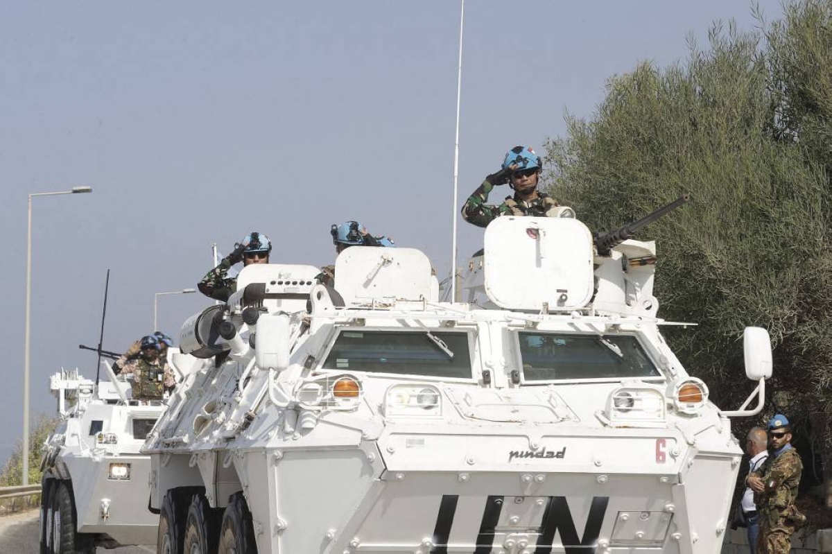 United Nations peacekeeping force in Lebanon (UNIFIL) vehicles drive along the main road leading to Lebanon's southern town of Naqura, close to the border with Israel on October 27, 2022. AFP PHOTO