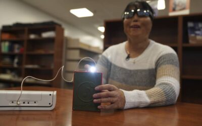 Blind People Can Experience April’s Total Solar Eclipse through Sound and Touch Devices Minh Ha, assistive technology manager at the Perkins School for the Blind, tries a LightSound device for the first time at the school’s library in Watertown, Massachusetts, on March 2, 2024. As eclipse watchers look to the skies in April 2024, new technology will allow people who are blind or visually impaired to hear and feel the celestial event. AP PHOTO