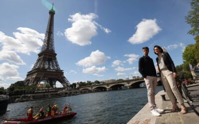 12 MONTHS TO GO Amelie Oudea-Castera (right), minister for Sport and the Olympic and Paralympic Games of France, and Tony Estanguet, president of the Paris 2024 Organizing Committee, watch a parade on the River Seine to test maneuvers, distances, duration and video capture of the future opening ceremony of the Paris Olympics, in Paris, France, Monday, July 17, 2023. XINHUA PHOTO