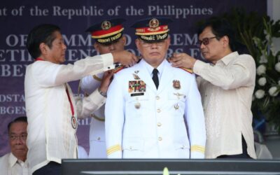 CHANGE OF COMMAND President Ferdinand Marcos Jr. and Interior Secretary Benjamin Abalos Jr. with Philippine National Police chief Maj. Gen. Rommel Francisco Marbil. PHOTO BY RENE H. DILAN