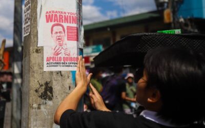 DOJ Chief Expects Lengthy Legal Battle Against Pastor Quiboloy Members of Akbayan Youth put up posters calling for the arrest of Pastor Apollo Quiboloy in Quezon City on Monday, March 18, 2024. PHOTOS BY JOHN ORVEN VERDOTE
