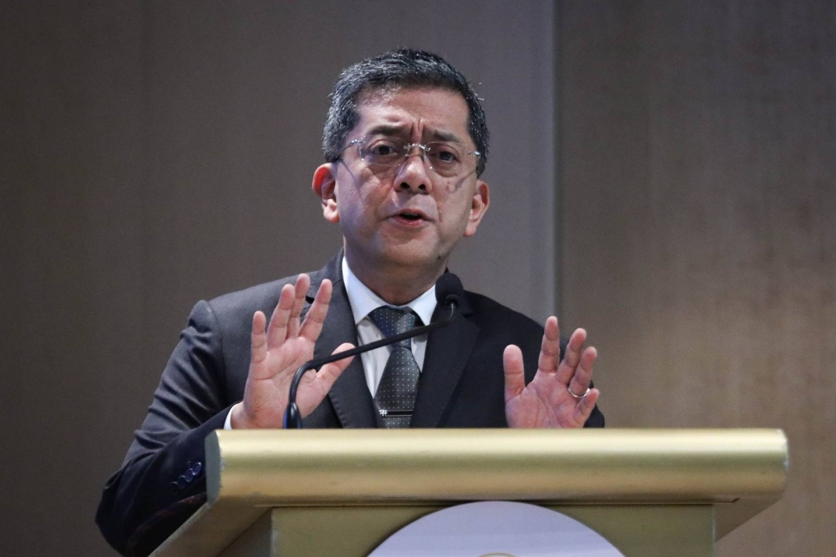 Commission on Elections (Comelec) Chairman George Erwin Garcia discusses the substitution of candidates during elections and the importance of the party-list system during a multiparty dialogue entitled "The Role of Party-list Organizations in Political and Electoral Reforms" in Taguig City, on Wednesday, April 3 2024. PHOTO BY J. GERARD SEGUIA