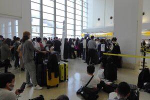 People crowd due to tsunami warning at Naha Airport in Naha, Okinawa prefecture on April 3, 2024. PHOTO BY JIJI PRESS/ AFP