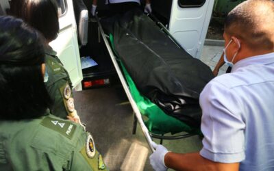 The bodies of two Philippine Navy pilots who died in a helicopter crash near the Cavite City Public Market during a training on Thursday, April 11, 2024 are carried onto a van as fellow soldiers watch. An investigation is underway to determine the cause of the accident. PHOTOS BY MIKE ALQUINTO