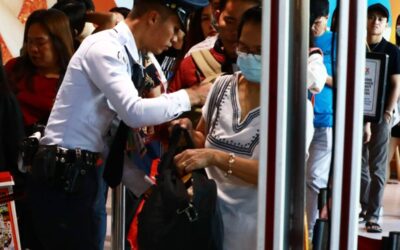 “Addressing Traffic Congestion and Improving Welfare: Modified Work Schedule for LGUs in Accordance with CSC Policy” BACK IN THE CITY A security guard checks the bags of passengers returning to Manila after spending their Holy Week break in the provinces, at the Parañque Integrated Terminal Exchange in Parañaque City, on Monday, April 1, 2024. PHOTO BY MIKE ALQUINTO