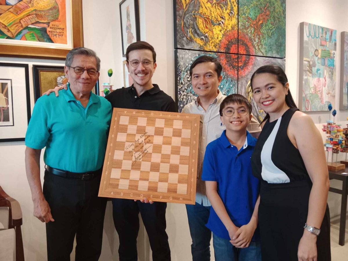 From left are Chess Hall of Fame Grandmaster Eugene Torre, Quezon City First District Rep. Arjo Atayde, Jay Ruiz, his son Gab and wife Marjorie Fe at the Sentro Artista Art Hub in Quezon City. CONTRIBUTED PHOTO