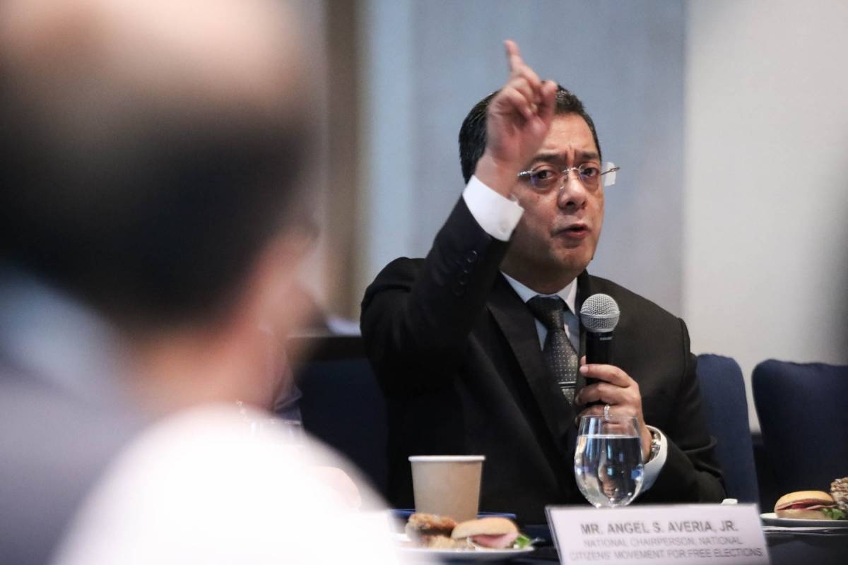 Commission on Elections (Comelec) Chairman George Erwin Garcia discusses the substitution of candidates during elections and the importance of the party-list system during a multiparty dialogue entitled "The Role of Party-list Organizations in Political and Electoral Reforms" in Taguig City, on Wednesday, April 3 2024. PHOTO BY J. GERARD SEGUIA
