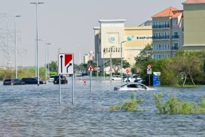Cars are stranded on a flooded street in Dubai following heavy rains, on April 19, 2024. Giuseppe CACACE / AFP