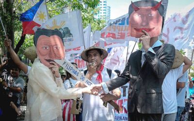 ‘GENTLEMAN’S AGREEMENT’ Protesters from the Alyansa Bantay Kapayapaan at Demokrasya show the ‘handshake’ between then-president Rodrigo Duterte and Chinese President Xi Jinping that apparently sealed a ‘gentleman’s agreement’ in which the Philippines and China will not take action in the West Philippine Sea (WPS) despite a 2016 arbitral ruling that allowed the Philippines to utilize marine resources within its exclusive economic zone. The protest took place in front of the Chinese Embassy in Makati City on Friday, April 19, 2024. PHOTO BY RENE H. DILAN