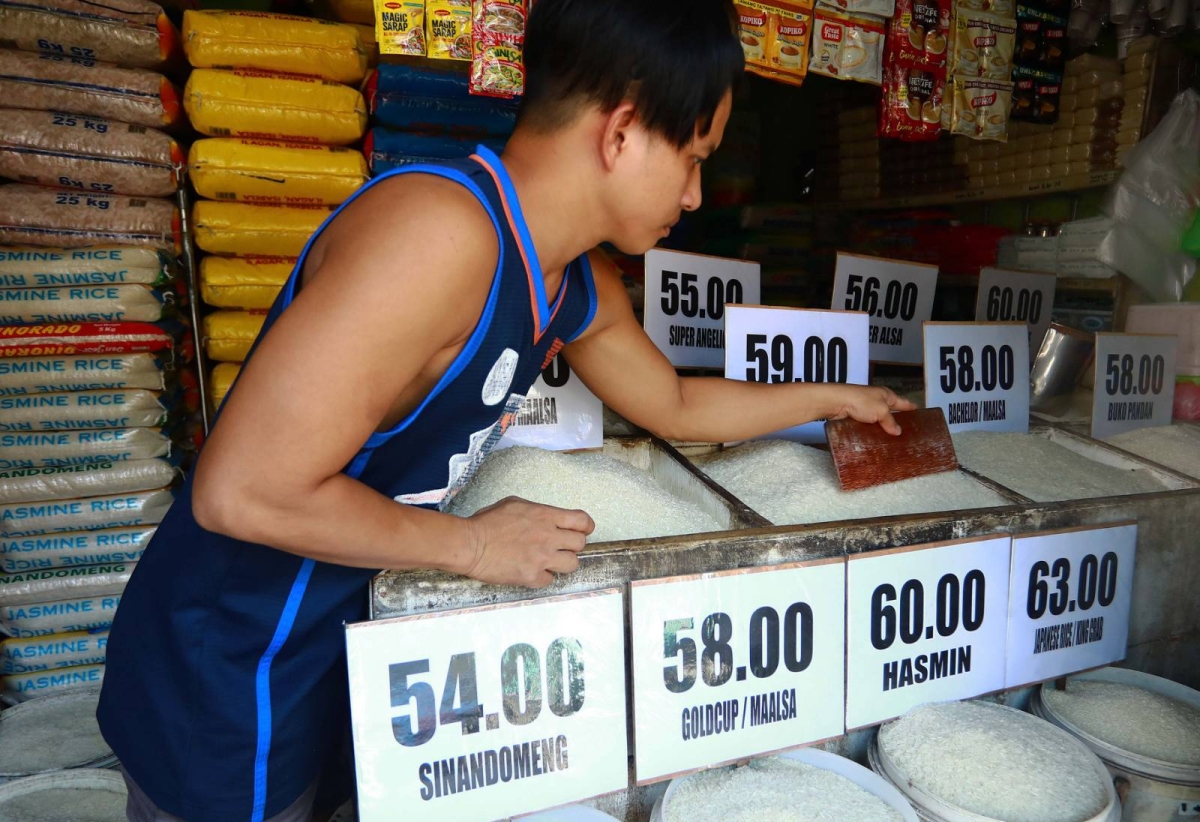Vendors arrange products in their stalls at the Paco Market in Manila on Sunday, April 21, 2024. President Ferdinand Marcos Jr. has called for a government-wide approach to improve efforts in eradicating hunger and ensuring food security. PHOTO BY MIKE ALQUINTO
