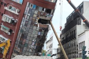 FAREWELL Heavy equipment is used to demolish the tilting Uranus building in Hualien on Friday, April 5, 2024. AFP Photo