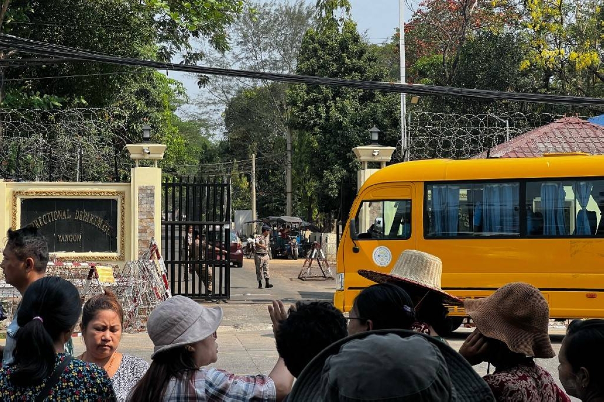 Relatives wait for prisoners being released from Insein prison for the Buddhist New Year, in Yangon on April 17, 2024. AFP PHOTO