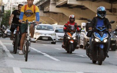 Bicycle riders are seen at the EDSA bike lane in Quezon City on Wednesday, April 24, 2024. The Metropolitan Manila Development Authority (MMDA), along with the Department of Transportation (DOTr), is considering removing the bicycle lane on EDSA to explore the possibility of building a dedicated motorcycle lane. According to the MMDA, only 1,500 cyclists use the bike lane daily compared to 170,000 motorcycles going through EDSA per day.  PHOTOS BY ISMAEL DE JUAN