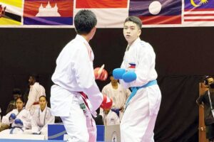 Sebastian Neil ‘Bashy’ Mañalac (right) fights Thailand’s Thanadet Thanatthanakorn in the -70 kilogram men’s Cadets Kumite finals during the 11th South East Asian Karate Federation Championships in Bangkok, Thailand. PHOTO FROM KARATE PILIPINAS SPORTS FEDERATION INC. FB PAGE