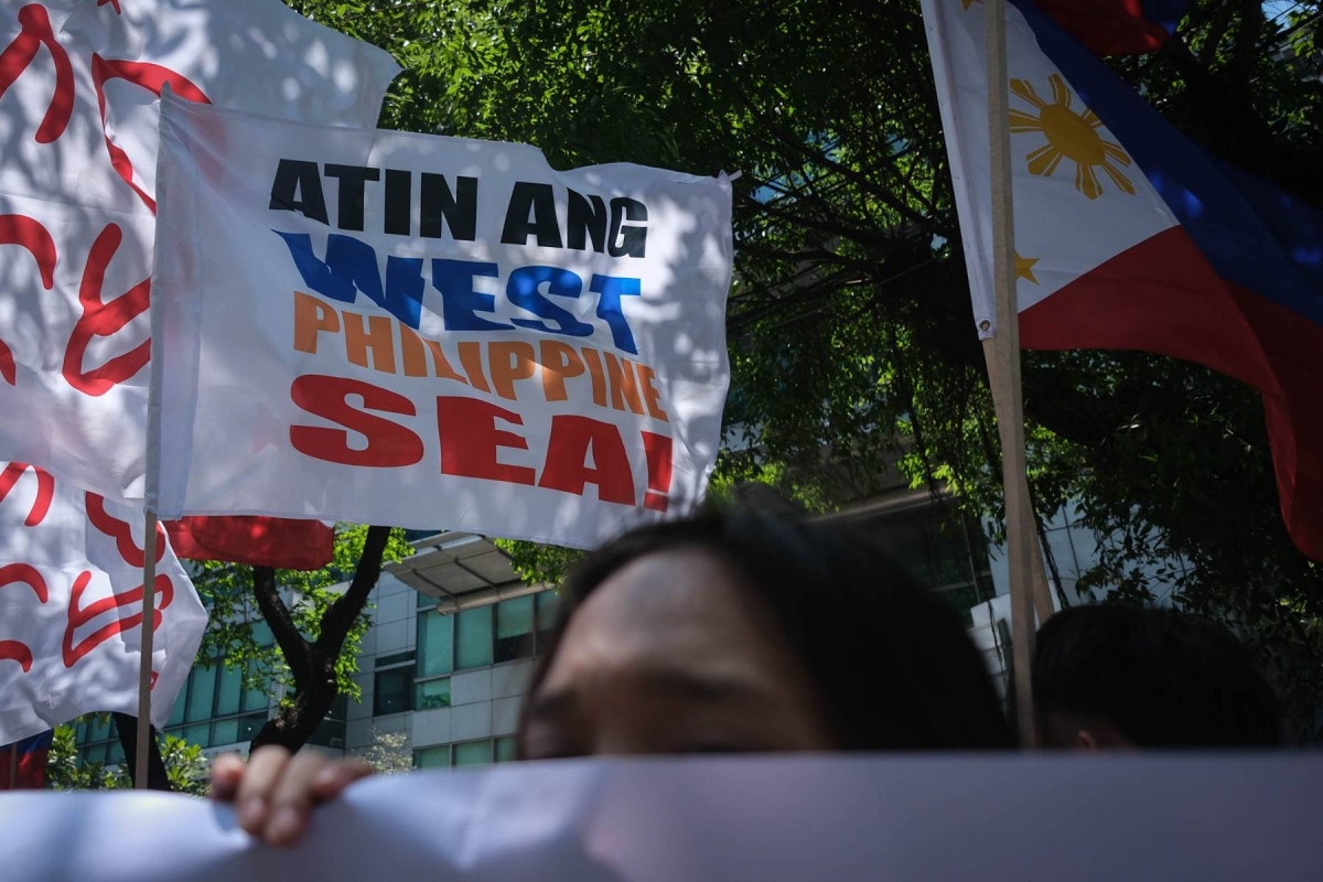The Alyansa Bantay Kapayapaan at Demokrasya rallies in front of the Chinese consulate in Makati City on Friday, April 19 2024, calling on China to respect the arbitral ruling on the West Philippine Sea and to stop harassing Philippine ships sailing within the country's exclusive economic zone (EEZ). The group also expressed outrage against the so-called 'gentlemen's agreement' between then president Rodrigo Duterte and Chinese President Xing Jinping on keeping the status quo in the West Philippine Sea. PHOTO BY J. GERARD SEGUIA
