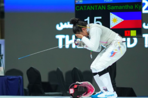 Samantha Catantan gets emotional after securing a spot in the 2024 Paris Olympics during the Asian & Oceania Olympic Qualification Tournament on Saturday night, April 27, 2024, at the Zayed Sports Complex in Fujairah, UAE. INTERNATIONAL FENCING FEDERATION PHOTO