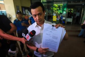 Former senator Antonio Trillanes appears before the prosecutors office in Quezon City where he files a case against presidential spokesperson Harry Roque on May 14 2024. The former senator included in his complaint other pro duterte Social media accounts. The complaint stemmed from alleged back channel talks with China and the former senator in 2012. PHOTOS BY JOHN ORVEN VERDOTE