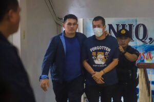 UNDER ARREST Gerard Raymond Talusan Yu (middle), the prime suspect in the Edsa- Ayala shooting incident on May 28, 2024 was presented to the media at Camp Crame on May 29. PHOTOS BY JOHN ORVEN VERDOTE